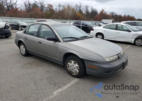 1999 Saturn Sl1 from USA, damaged, VIN 1G8ZH5284XZ187243